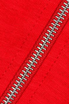 Zipper of a red cotton sweater