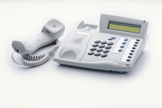 The telephone set of offhook milk white color is ready to a call