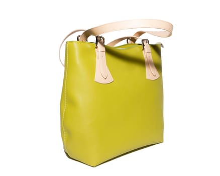 The photograph shows a female handbag on a white background