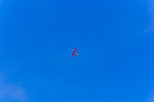 Photo of flying military plane in blue sky