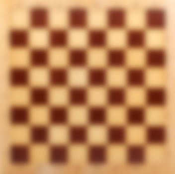 Abstract blur wooden chessboard bokeh background