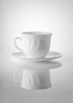 Cups for tea with saucers on a white background