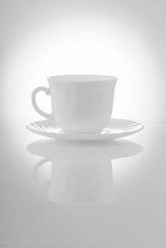 Cups for tea with saucers on a white background