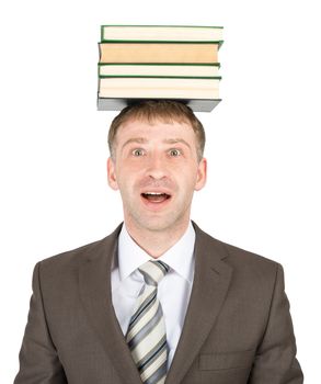 Young man holding stack of books isolated on white background