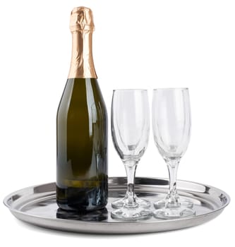 Champagne bottle and two champagne glasses on tray isolated on white background