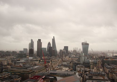 Dark sky and rain over wet London panorama view