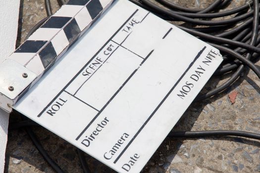 close up image of Film Slate on set