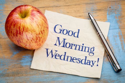 Good Morning Wednesday - handwriting on a napkin with a fresh apple