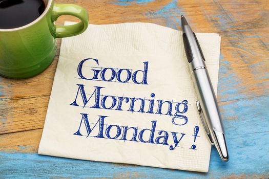 Good Morning Monday - handwriting on a napkin with a cup of coffee and cookie