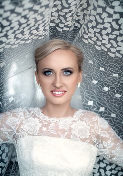 bride in a white dress, blue eyes