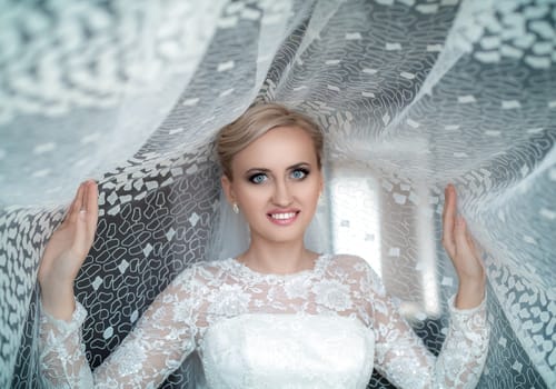 bride in a white dress, blue eyes