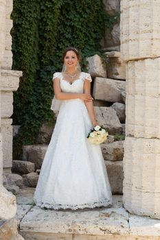 girl, wedding, expensive dress, summer day, the bride with large eyes