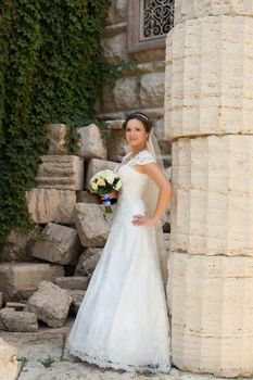 girl, wedding, expensive dress, summer day, the bride with large eyes