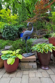 Garden Backyard Japanese Asian Theme Design Landscaping with Plants Crane Sculpture and Stone Lantern