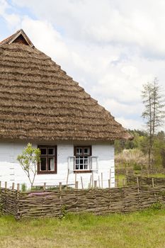 old traditional wooden polish cottage in open-air museum, Ethnographic Park, Kolbuszowa, Poland