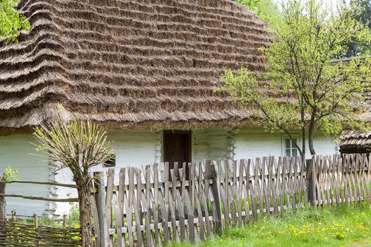 old traditional wooden polish cottage in open-air museum, Ethnographic Park, Kolbuszowa, Poland