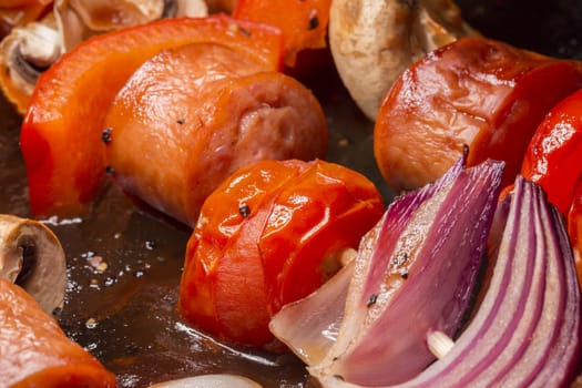 Skewers with Tomatoes, bell pepper, red onion, chorizo and mushrooms.