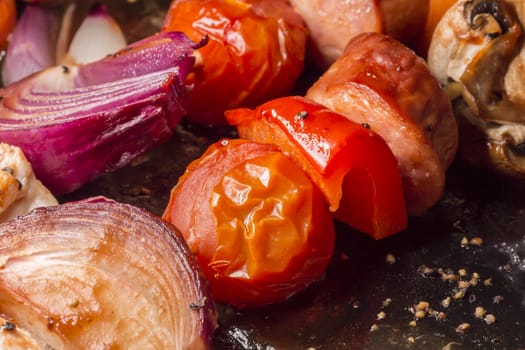 Skewers with Tomatoes, bell pepper, red onion, chorizo and mushrooms.