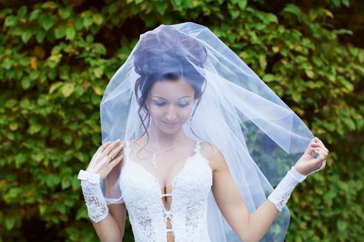 Portrait of a bride in a white dress