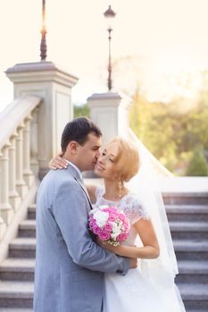 The bride and groom for a walk