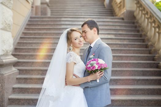 The bride and groom for a walk