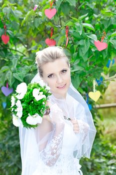 Portrait of beautiful young girl outdoors in spring