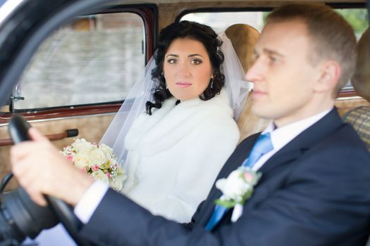 The bride and groom in wedding day for a walk