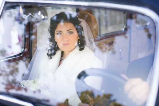 The bride and groom in wedding day for a walk