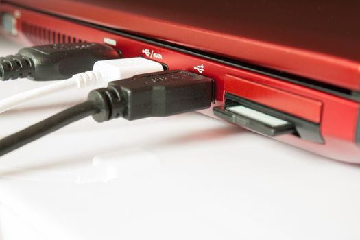 Sd card and USB, HDMI cable are connecting to laptop computer