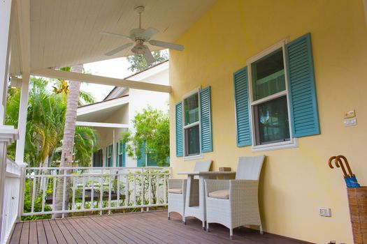 Two chairs on wooden deck. Modern outdoor furniture on wooden deck