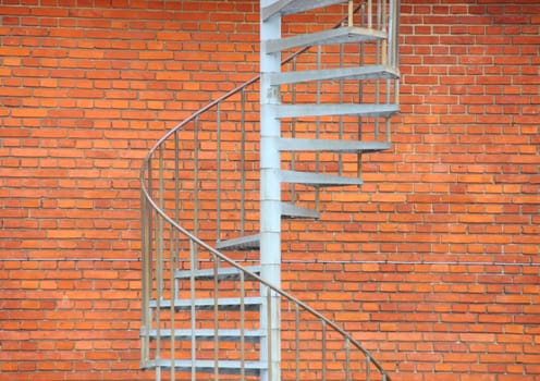 Metal staircase outside building as fireescape