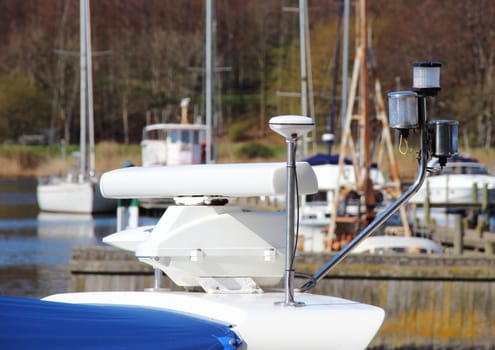 Isolated ship navigation equipment with port in background