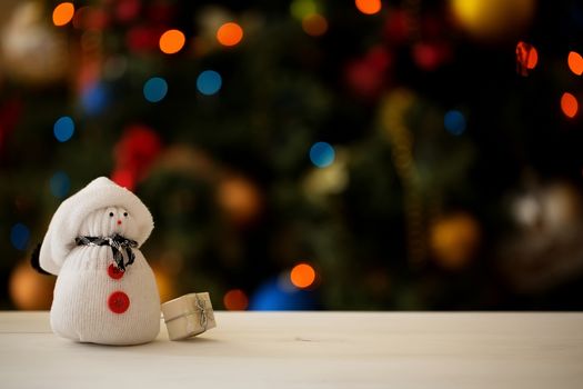 Snowman on a Christmas tree background