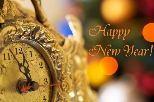 Happy New Year, clock before midnight with inscription Happy New Year!