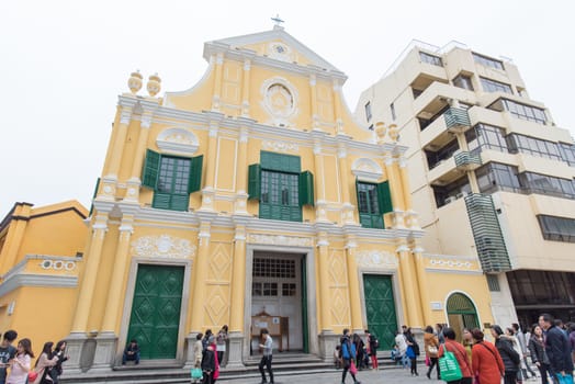Macau - March 12, 2016 : People walking around Church of St. Dominic (Domingos). Largo do Senado in Macau