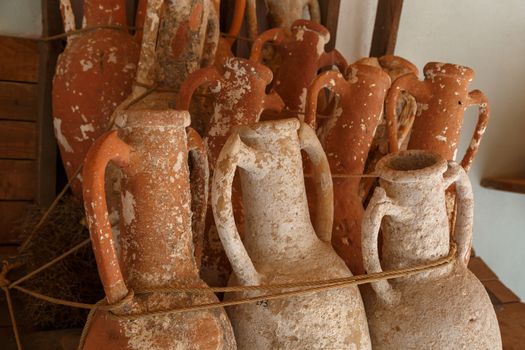 Close up detailed view of historical clay amphora used in old times.