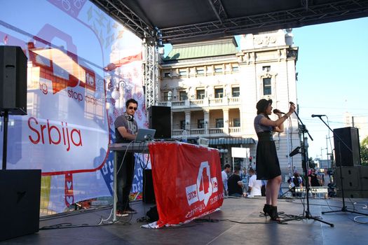 BELGRADE,SERBIA-AUGUST 12, 2011:Zoe,singer of the band Zemlja gruva at the event dedicated to fighting AIDS under the name Dance4life
