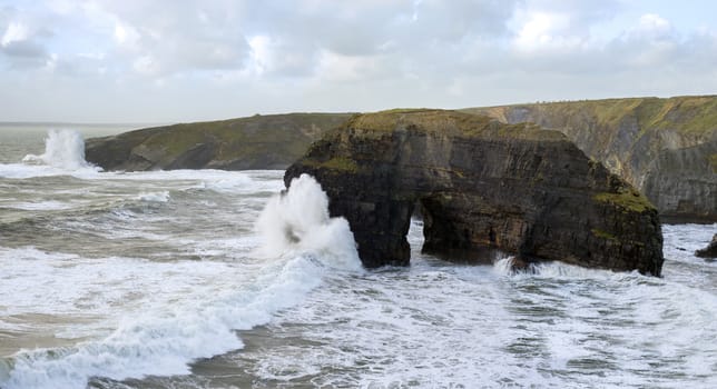 beautiful view of the virgin rocks with storm waves on the wild atlantic way