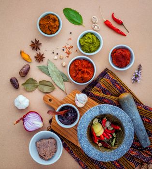 Assortment of  Thai food Cooking ingredients spice taste . Healthy and delicious foods. Paste of thai popular food red curry and green curry. Chili paste of  Thai food Cooking ingredients.