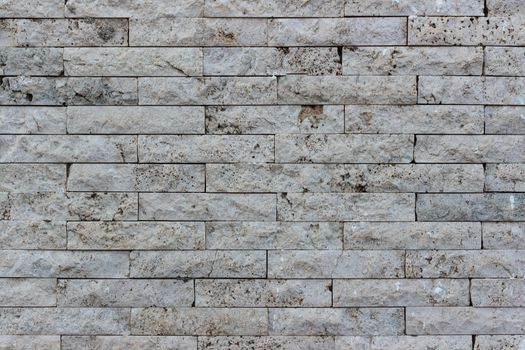 Wall of bricks in Vulcanic Stone, useful for background.