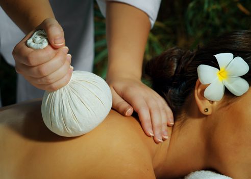 portrait of young beautiful woman in spa environment