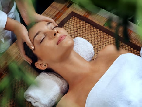 portrait of young beautiful woman in spa environment.