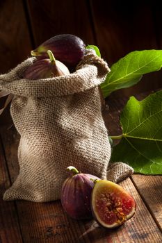 close up view of fresh figs on color back