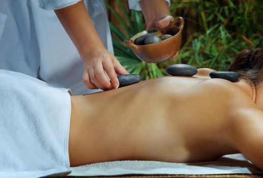 portrait of young beautiful woman in spa environment