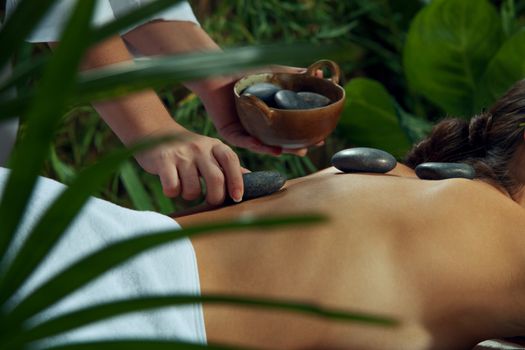 portrait of young beautiful woman in spa environment