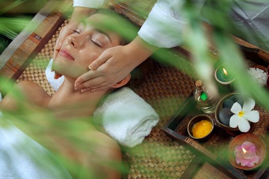 portrait of young beautiful woman in spa environment