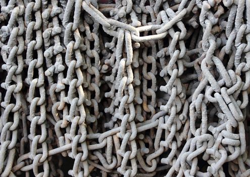 Industrial gray chains hanging on a truck