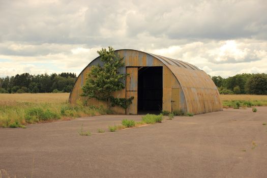 Sheet metal shelter with open door
