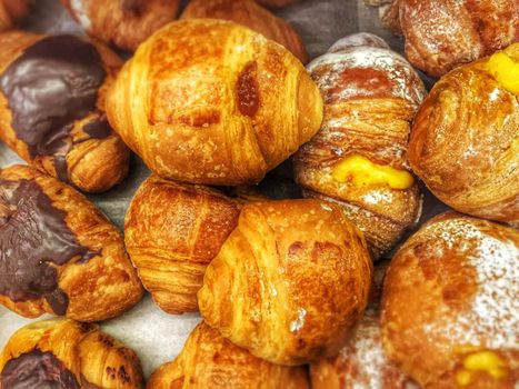 a bunch of sweet croissants ready ofr breakfast