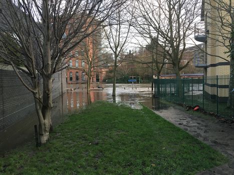 UNITED-KINGDOM, Leeds : Parts of Leeds near the Royal Armouries museum are submerged in flood waters after heavy rainfall hits northern England on December 27, 2015 in West Yorkshire. December 2015 has been the wettest on record for parts of the UK and has seen several communities swamped by rising waters, Met Office figures show. Flood alerts and warnings were issued since the beginning of the month across England and Wales as Storm Desmond, Eva then Frank take hold and bring torrential rain. The leader of Leeds City Council has said the authority had warned the Government that flooding in Leeds was a catastrophe waiting to happen on December 27, 2015. 
